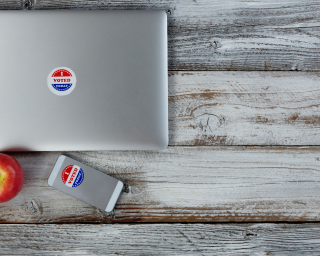 closed laptop with "i voted today" sticker